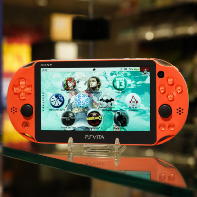 Home New 24 Neon Orange PS Vita Slim front view